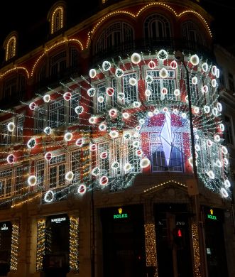 Christmas Lights on the Marcolino Clock Shop Facade in Porto